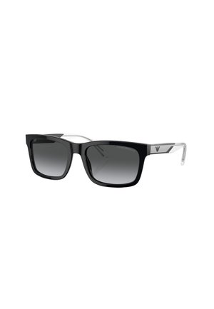 Lunettes de soleil rectangulaires noires avec des verres gris dégradés, monture en plastique brillant et accent en argent sur les branches. Embouts en plastique transparent sur les branches.