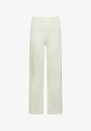 Beżowe szerokie spodnie z wysokim elastycznym pasem, gładką teksturą, bez widocznych kieszeni ani ozdób.