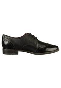 Chaussure Oxford en cuir noir avec détails brogue, talon bas et fermeture à lacets, vue de côté extérieur.