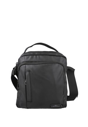 Bolso de hombro compacto negro con bolsillo frontal con cremallera, asa superior y correa ajustable, hecho de material liso.