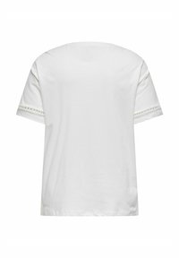 Witte T-shirt met korte mouwen van katoen. Voorzien van een ronde halslijn en verfijnde kantdetails op de mouwen. Zachte textuur.