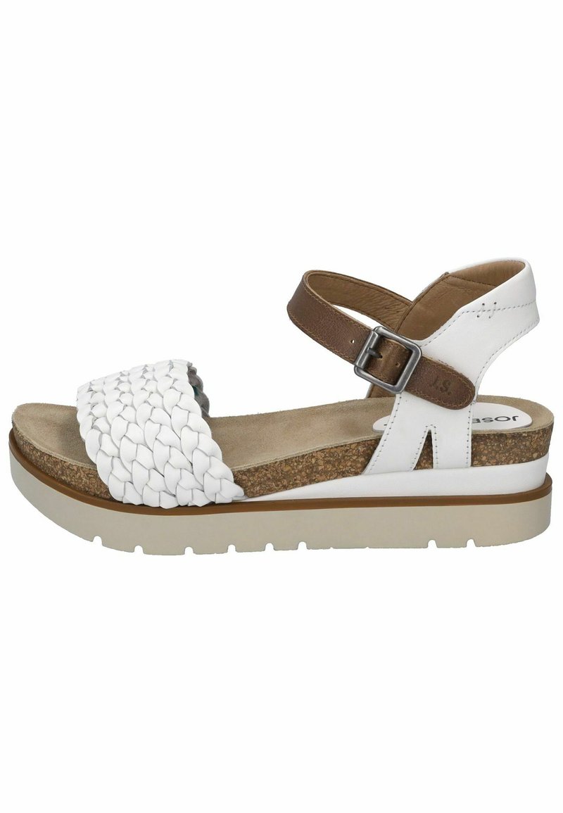 White leather sandal with woven strap detail, brown ankle strap, cork footbed, and a white rubber sole with a slight wedge.