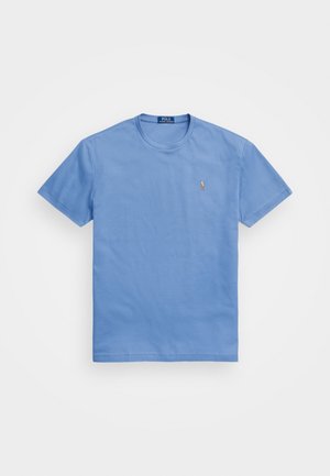 Light blue cotton T-shirt with a round neckline, short sleeves, and a small embroidered logo on the left chest. Smooth texture.