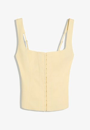 Top corset sans manches jaune clair avec encolure carrée, fermeture avant verticale à agrafes et bretelles réglables.