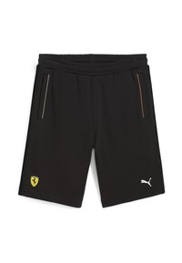 Shorts deportivos negros hechos de material suave, con bolsillos laterales, logo de Puma en blanco y un emblema amarillo de Ferrari en el dobladillo.