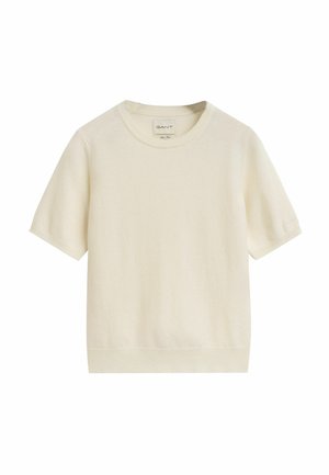 Cream-colored short-sleeve knit sweater with a round neckline and ribbed edges, made from soft material. Subtle texture and minimal detailing.