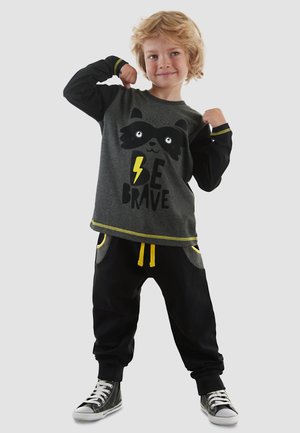 Denokids, BEKLEIDUNG RAWR COMICS XT SET - Pantalon de survêtement - black cff