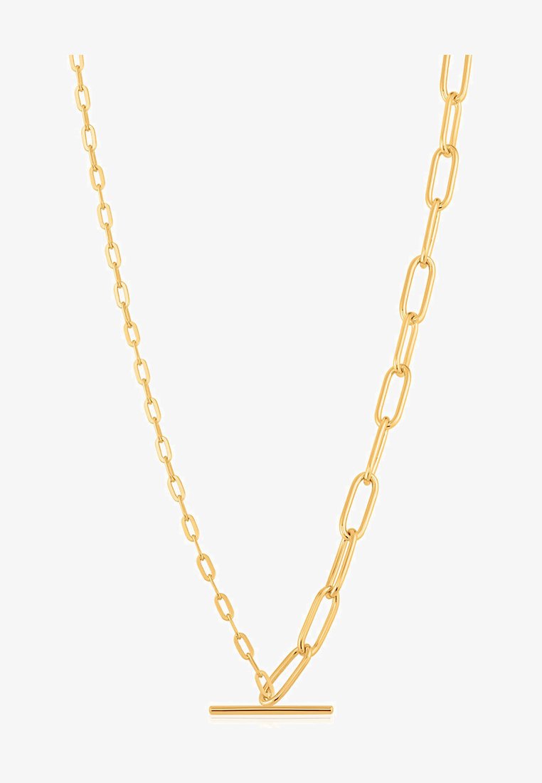 Collana in oro con catena presenta maglie allungate e un chiusura a toggles orizzontale, evidenziando un design elegante e moderno.