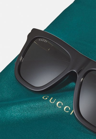 Gucci Slnečné okuliare - black/grey