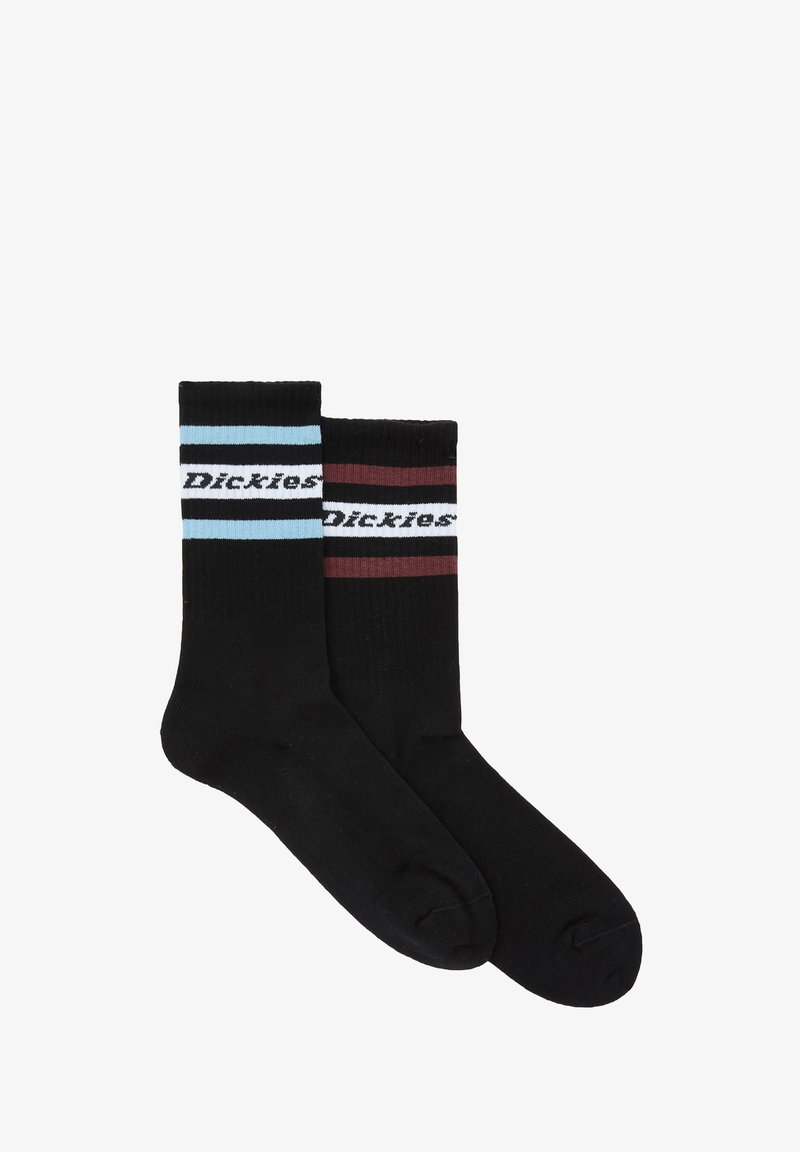 Due calze Dickies nere con polsini a coste, una con strisce blu e bianche, l'altra con strisce bordeaux e bianche vicino alla parte superiore.