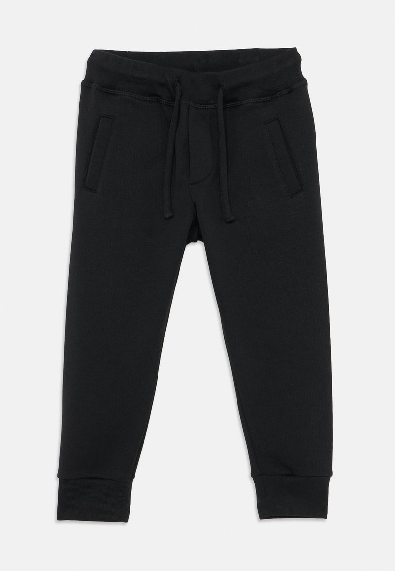 Pantalon de survêtement noir en tissu doux avec une taille élastique à cordon, deux poches latérales et des poignets côtelés.