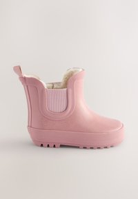 Pink vandtæt ankelstøvle med tekstureret sål og foret med blødt fleece, designet til kolde og våde vejrforhold.