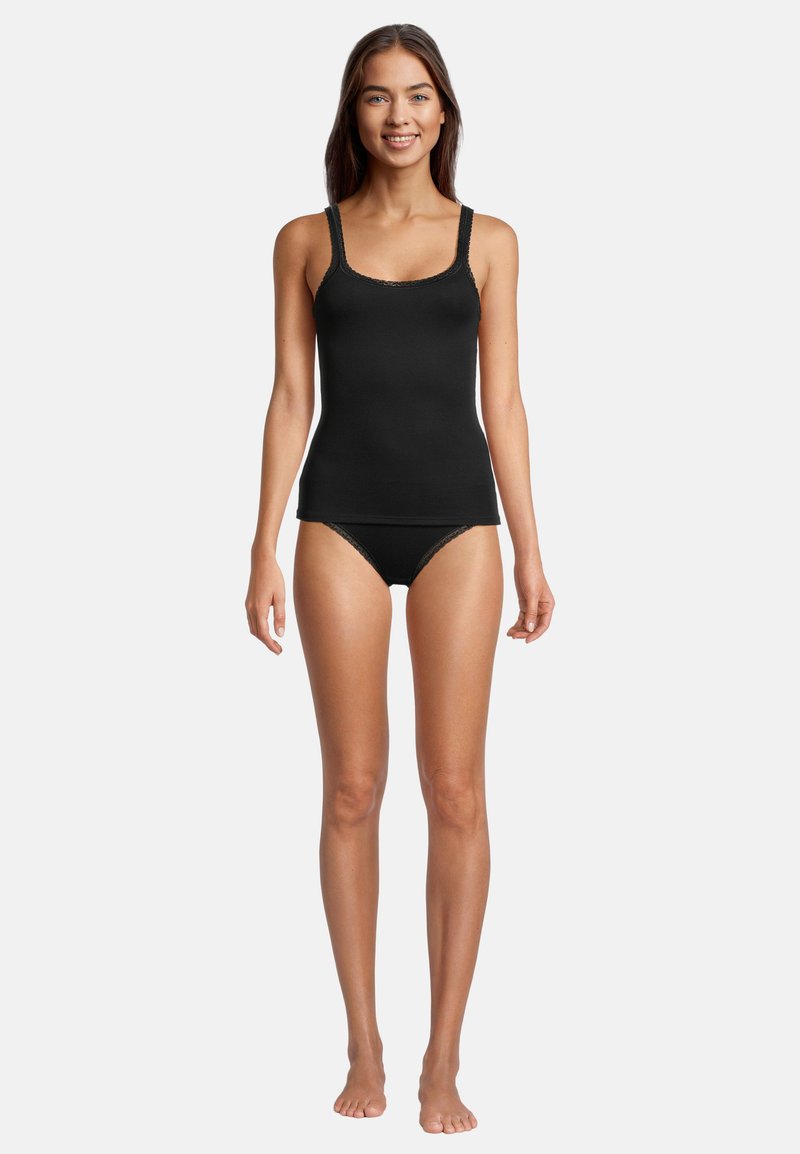 Black tank top with adjustable straps, lace trim, and fitted design. Paired with matching black briefs, presented on a model.