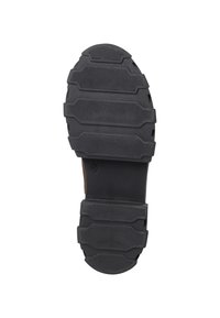 Black rubber sole with deep treads and multi-layered design. Includes rectangular and hexagonal patterns for enhanced grip.