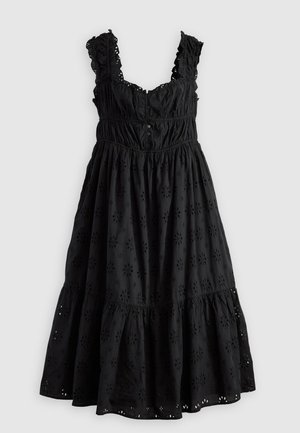 Black dress featuring a ruffled neckline and straps, button front, and floral embroidery. Flowy, tiered design with a below-the-knee length.