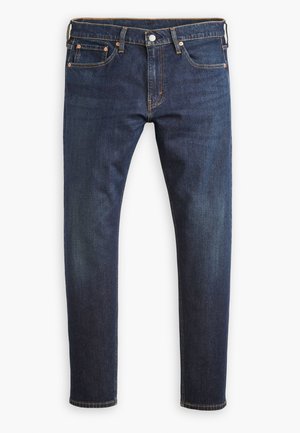 Jeans in denim blu scuro con una vestibilità dritta, dotati di cinque tasche, cuciture arancioni, chiusura con bottone in argento e finitura pulita all'orlo.