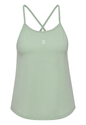 Jasnozielony top bez rękawów z cienkimi skrzyżowanymi ramiączkami i dwoma małymi białymi strzałkami umieszczonymi na środku poniżej linii dekoltu