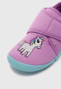 Purple fabric shoe with a turquoise rubber sole, featuring an embroidered unicorn design with multicolored mane and details.