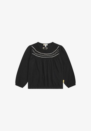 Top negro de manga larga con un escote fruncido, bordado en blanco contrastante y puños elásticos. Presenta una sutil etiqueta de la marca en el lado.