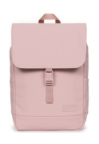 Pink polyester backpack with a flap closure, adjustable strap, and front buckle. Smooth texture and minimalistic design.