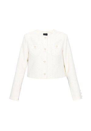 Valkoinen lyhyt takki, jossa pitkät hihat, pyöreä pääntie, helmipainikkeet edessä ja rintataskuissa, teksturoitu kangas.