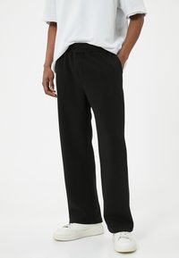 Koton POCKET DETAIL - Trainingsbroek - black