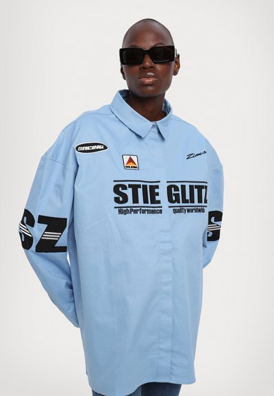 Stieglitz REZA - Gombos blúz - blue