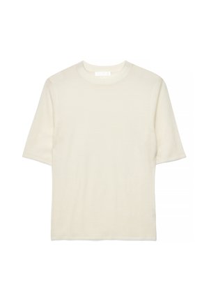 Krēmkrāsas īsroku adīts tops ar apaļu kakla izgriezumu, vienkārša dizaina bez redzamām rakstu zīmēm vai rotājumiem, izklāts plakani uz baltas virsmas.