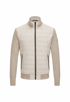 Beige Jacke mit gesteppter Vorderseite, gestrickten Ärmeln, Stehkragen, Frontreißverschluss und Reißverschlusstaschen. Gerippte Bündchen und Saum.