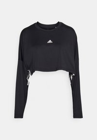 Czarna krótka bluzka sportowa z długim rękawem, okrągłym dekoltem i białym logo Adidas. Wykonana z gładkiego, elastycznego materiału. Posiada warstwowy design po bokach.