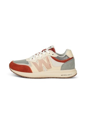 Sneakers featuring a beige synthetic upper with grey, orange, and red suede accents, mesh inserts, and a rubber sole labeled "NATURAL SOFT."