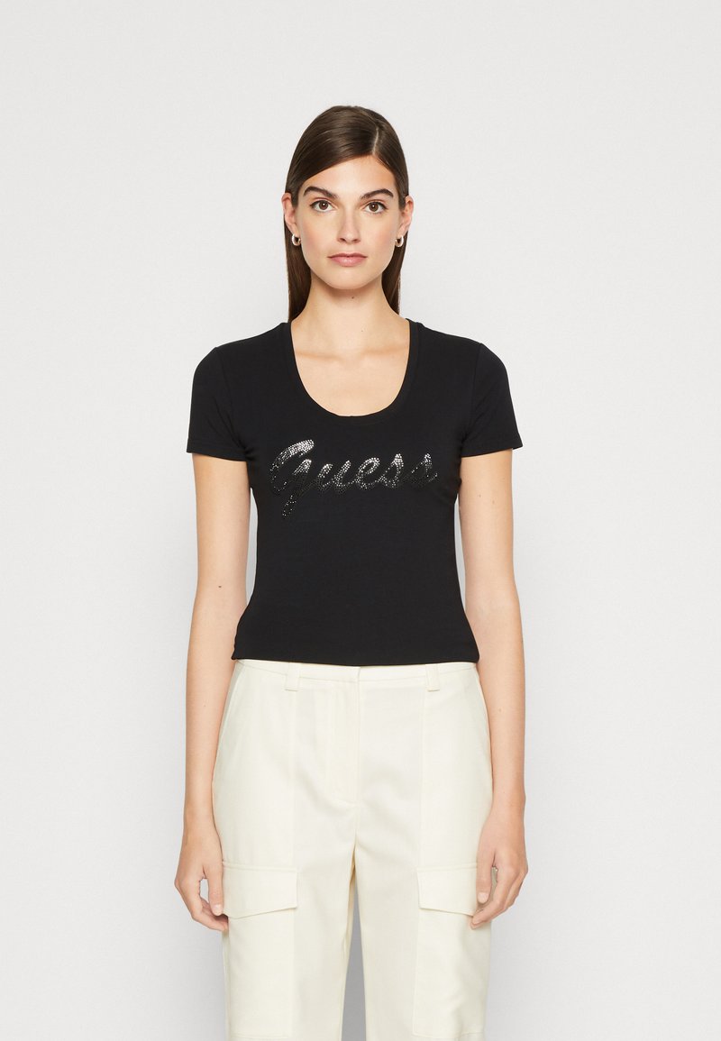 Tee-shirt GUESS Noir Taille Small - 94% Coton, 6% Elastane, Occasion Très Bon état