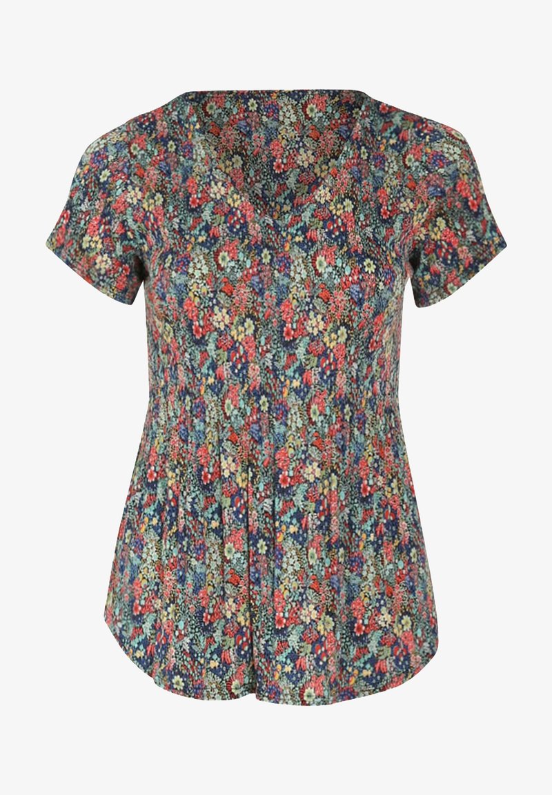 Blouse femme à manches courtes avec col en V présentant un motif floral multicolore dense sur fond sombre.