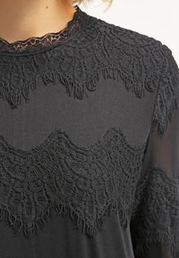 Cream Jerseyklänning - black