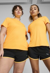 Puma RUN FAVORITES VELOCITY W - Sportovní tričko - sun stream