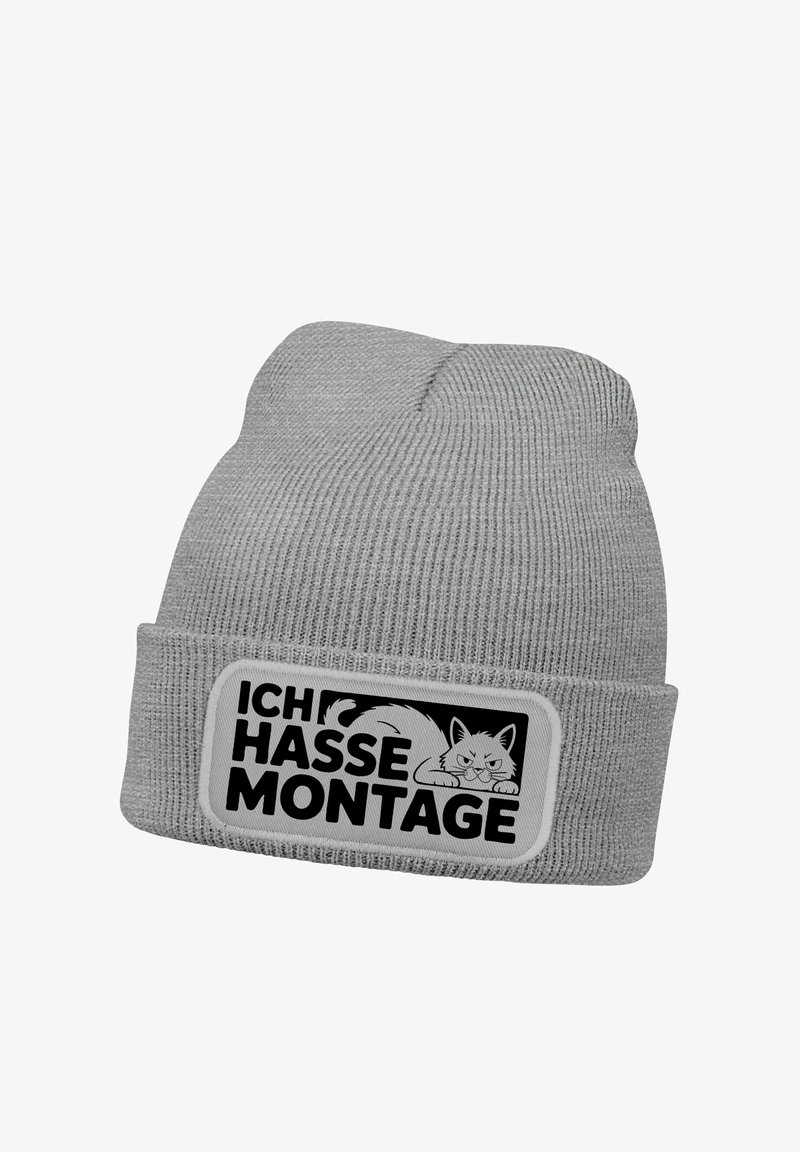 Gray knit beanie with a folded cuff, featuring a rectangular patch displaying the text "ICH HASSE MONTAGE" and a cat illustration in black.