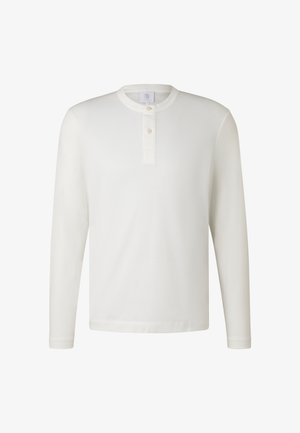 Long-sleeve white henley shirt made from cotton, featuring a round neckline, three-button placket, and a soft, smooth texture.