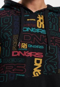 Black hoodie featuring multicolored "DNGRS" logos in various sizes and orientations. Material appears soft with a textured finish.