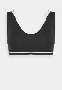 Sutiã desportivo preto com decote arredondado, feito de tecido suave, apresentando uma faixa listrada em branco e cinza na parte de baixo.