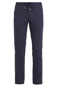 Marineblå sweatpants lavet af blødt stof, med elastisk talje og snor, indsnævrede ben og uden lommer.