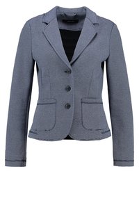 Marinblå kavaj med ett texturerat randmönster, enkelknäppt design, slagkrage och tre knappar. Har två framfickor.