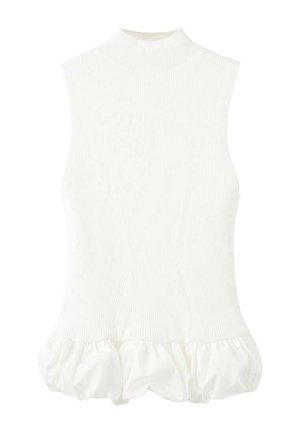 Top alb fără mâneci, cu un gât înalt, textură canelată și un tiv volanat. Proiectat cu o siluetă ajustată. Fabricat din material tricotat.