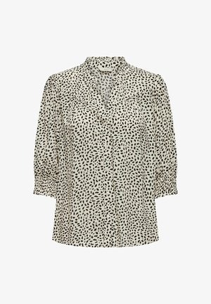 Chemisier à boutons en tissu léger, avec une base crème parsemée de taches noires, col structuré et manches 3/4 élastiques.