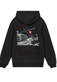 Black hooded sweatshirt featuring a white line drawing of buildings and railroad tracks, with a bold orange sun and "ESCAPE" text.