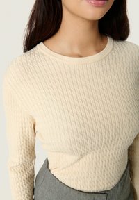 Soaked in Luxury SPINA CABLE  - Trui - sandshell