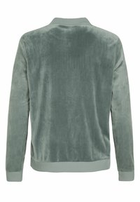 Groene fluwelen bomberjack met geribde kraag en boorden. Zachte textuur, effen kleur en zijnaaddetails. Geschikt voor casual wear.