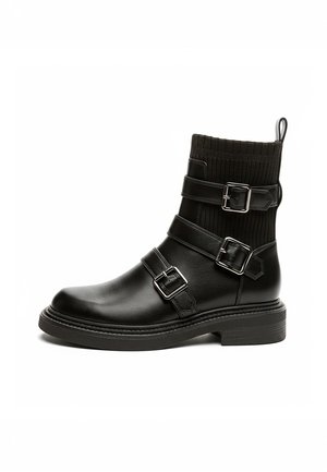 Botines camperos - black