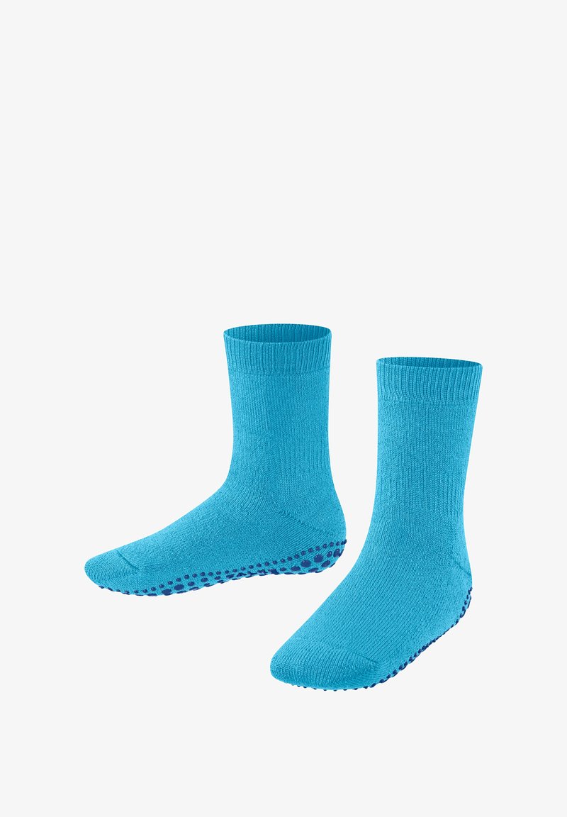 Türkisblaue Socken mit geripptem Bündchen und rutschfester Sohle mit blauen Punkten. Weicher Stoff, knöchelhohe Länge, entworfen für Komfort und Stabilität.