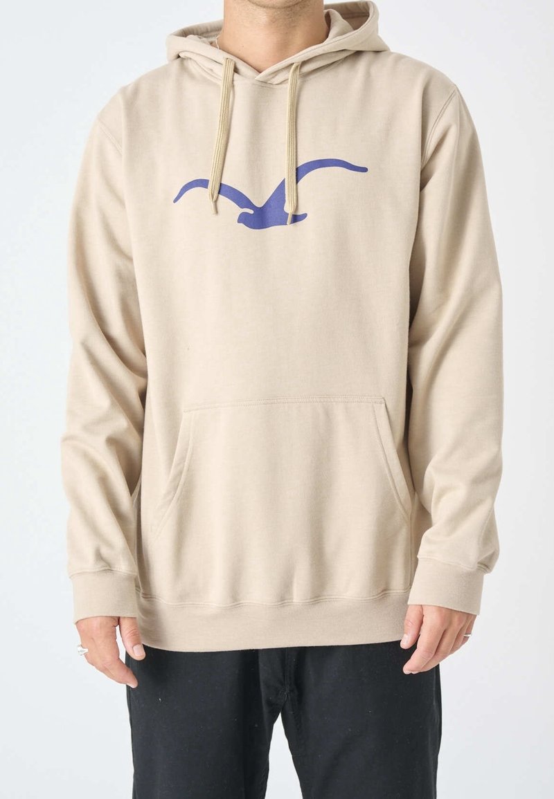 Felpa beige con tasca frontale, cappuccio regolabile con cordino e una grafica di un uccello viola sul petto. Materiale in cotone con una texture liscia.