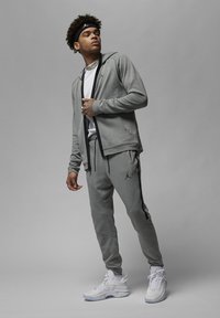 Jordan - M J DF SPRT STMT AIR FLC  - Pantaloni de trening - dk grey heather/black Imagine miniatură 1